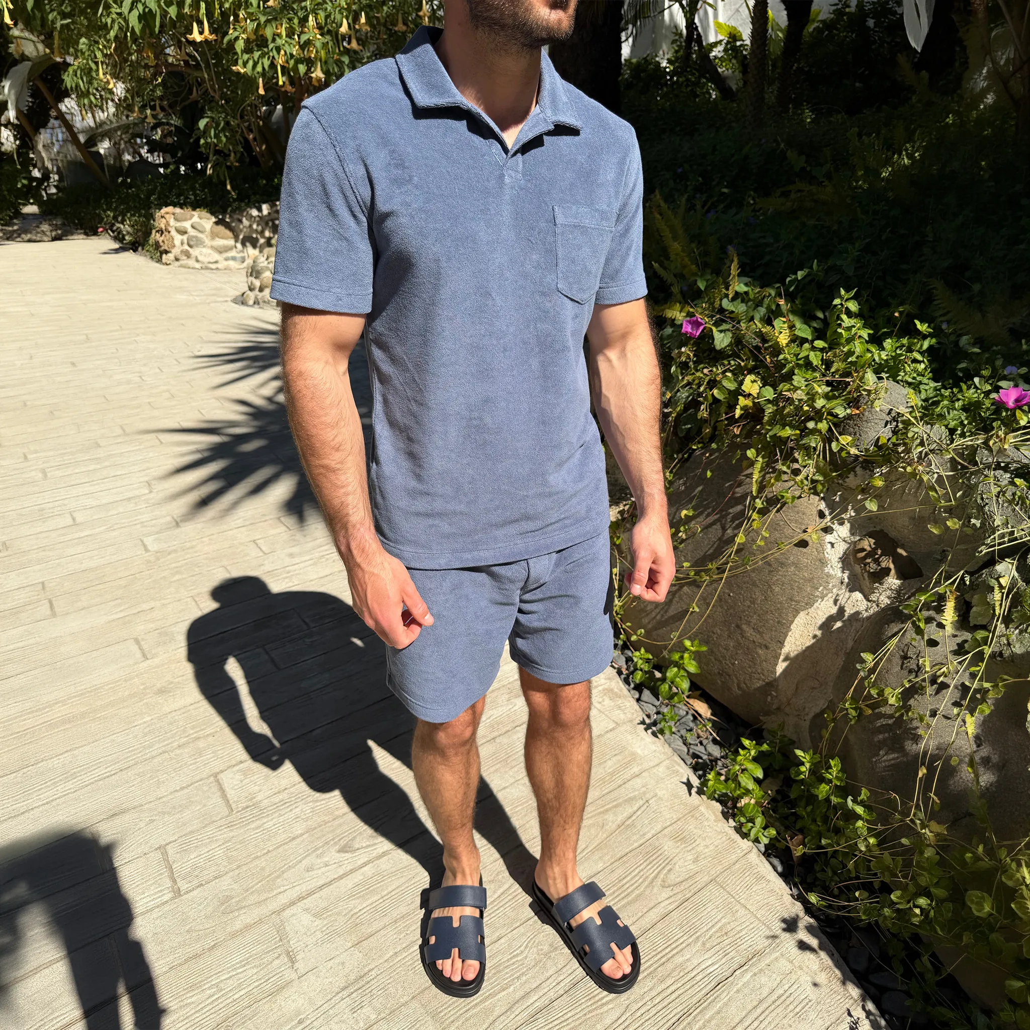 Model View of Premio Collective Terry Towelling Deep Blue Polo Shirt